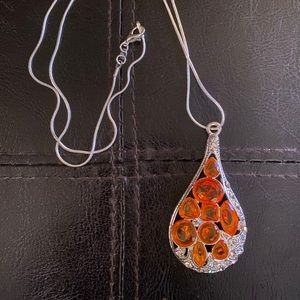 Very beautiful bright Orange stones, lovely piece.
